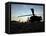 A UH-60 Black Hawk Helicopter on the Flight Line at Sunset-null-Framed Premier Image Canvas