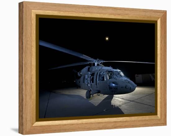 A UH-60 Black Hawk Helicopter Parked on the Flight Line under a Full Moon-null-Framed Premier Image Canvas