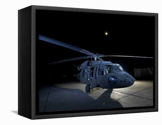 A UH-60 Black Hawk Helicopter Parked on the Flight Line under a Full Moon-null-Framed Premier Image Canvas