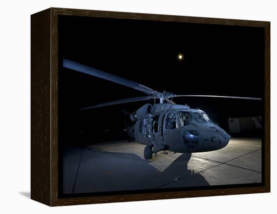 A UH-60 Black Hawk Helicopter Parked on the Flight Line under a Full Moon-null-Framed Premier Image Canvas