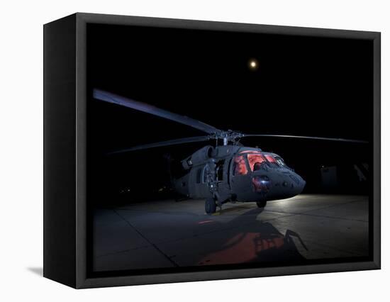 A UH-60 Black Hawk Helicopter Parked on the Flight Line under a Full Moon-null-Framed Premier Image Canvas