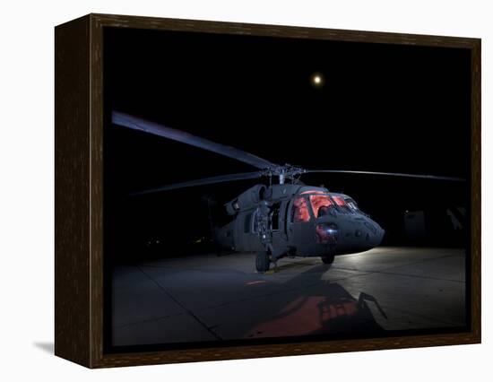 A UH-60 Black Hawk Helicopter Parked on the Flight Line under a Full Moon-null-Framed Premier Image Canvas