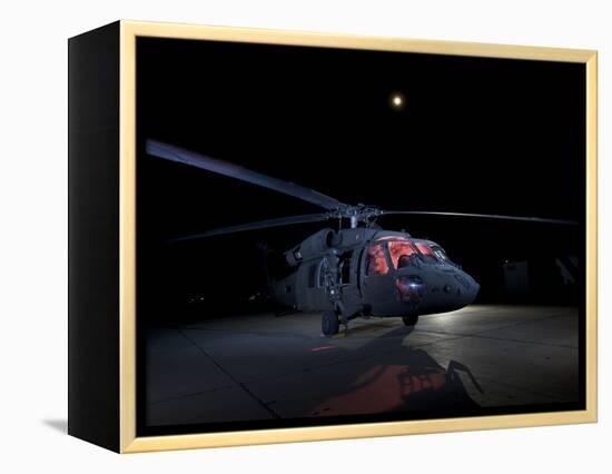 A UH-60 Black Hawk Helicopter Parked on the Flight Line under a Full Moon-null-Framed Premier Image Canvas