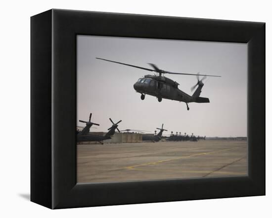 A UH-60 Black Hawk Taking Off for a Mission over Northern Iraq-null-Framed Premier Image Canvas