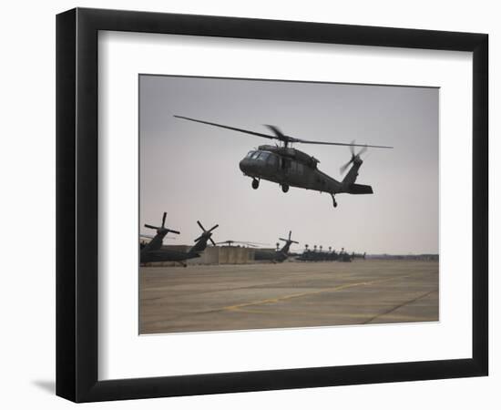 A UH-60 Black Hawk Taking Off for a Mission over Northern Iraq-null-Framed Photographic Print