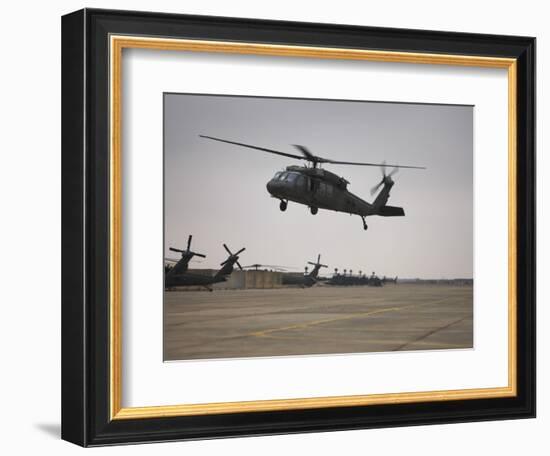 A UH-60 Black Hawk Taking Off for a Mission over Northern Iraq-null-Framed Photographic Print