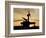 A UH-60L Black Hawk Helicopter Silhouetted by the Setting Sun-null-Framed Photographic Print