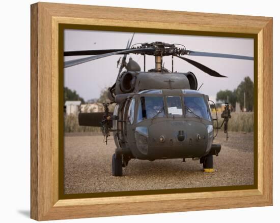 A UH-60L Black Hawk with Twin M240G Machine Guns at the Victory Base Complex in Baghdad, Iraq-null-Framed Premier Image Canvas