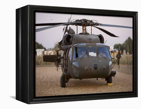 A UH-60L Black Hawk with Twin M240G Machine Guns at the Victory Base Complex in Baghdad, Iraq-null-Framed Premier Image Canvas