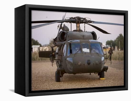 A UH-60L Black Hawk with Twin M240G Machine Guns at the Victory Base Complex in Baghdad, Iraq-null-Framed Premier Image Canvas