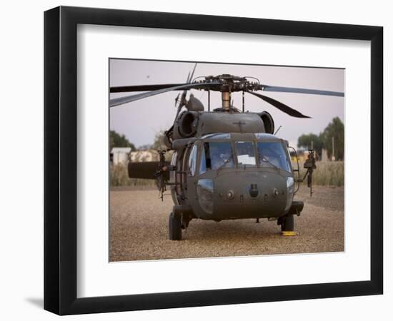 A UH-60L Black Hawk with Twin M240G Machine Guns at the Victory Base Complex in Baghdad, Iraq-null-Framed Photographic Print