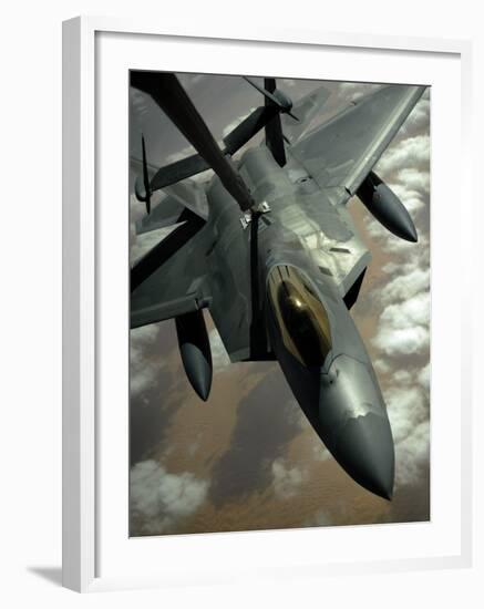 A US Air Force F-22 Raptor Is Refueled by a Kc-10A Extender Aircraft over Southwest Asia-null-Framed Photographic Print