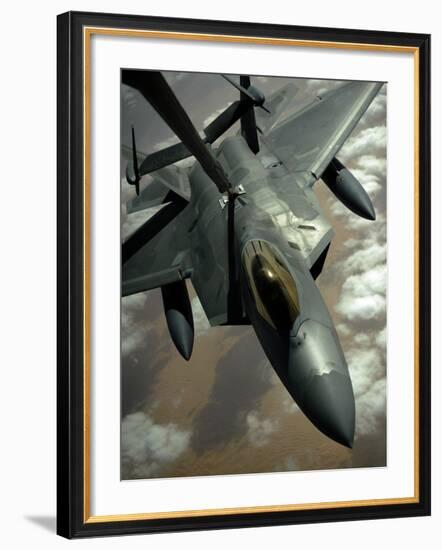 A US Air Force F-22 Raptor Is Refueled by a Kc-10A Extender Aircraft over Southwest Asia-null-Framed Photographic Print