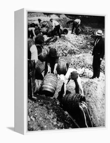 A Us Federal Agent Oversees the Destruction of Beer Kegs During the American Prohibition Era…-American Photographer-Framed Premier Image Canvas