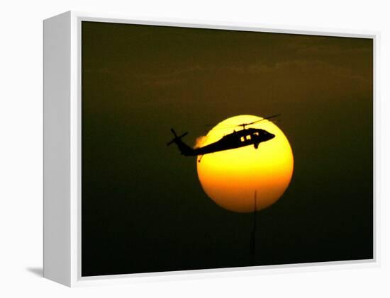 A US Military Helicopter Flies Over the Heavily Fortified Green Zone-Dusan Vranic-Framed Premier Image Canvas