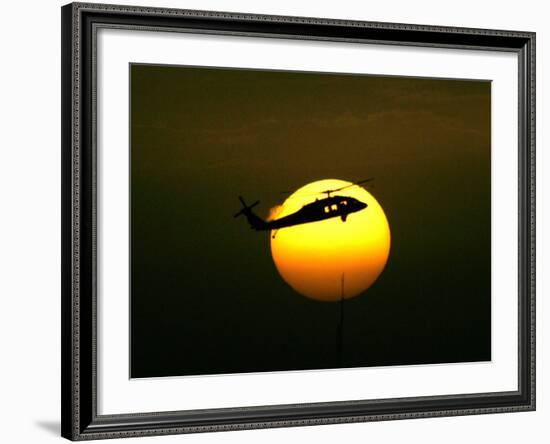 A US Military Helicopter Flies Over the Heavily Fortified Green Zone-Dusan Vranic-Framed Photographic Print