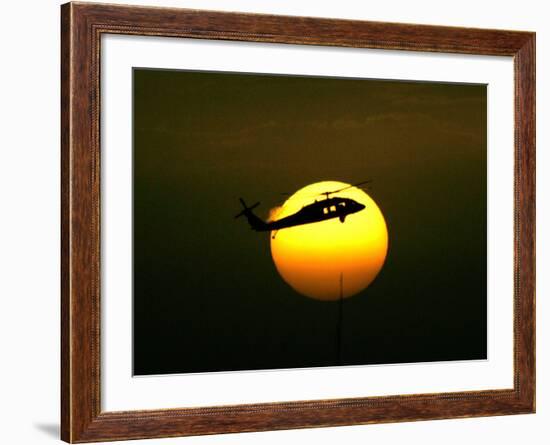 A US Military Helicopter Flies Over the Heavily Fortified Green Zone-Dusan Vranic-Framed Photographic Print