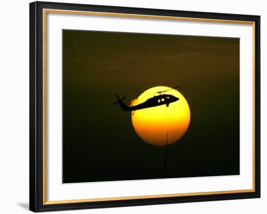 A US Military Helicopter Flies Over the Heavily Fortified Green Zone-Dusan Vranic-Framed Photographic Print