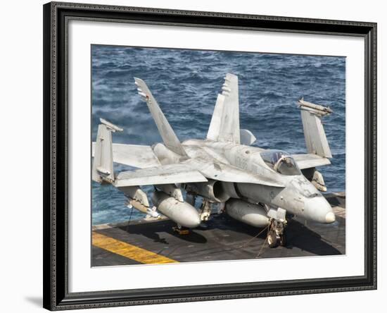 A US Navy F/A-18C Hornet Tied on the Flight Deck of USS Nimitz-Stocktrek Images-Framed Photographic Print