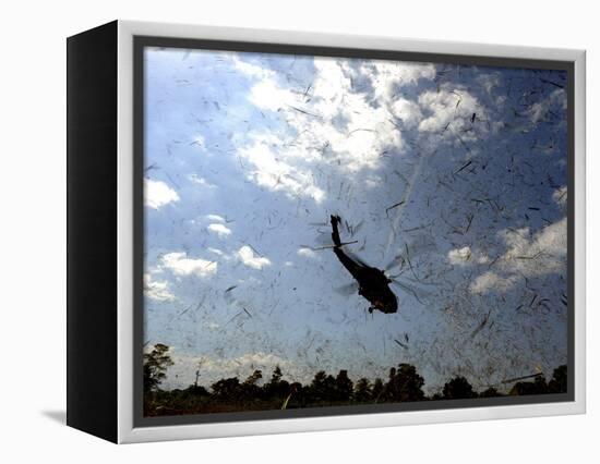 A US Navy Hh-60 Seahawk Stirs Up Debris While Taking Off-null-Framed Premier Image Canvas