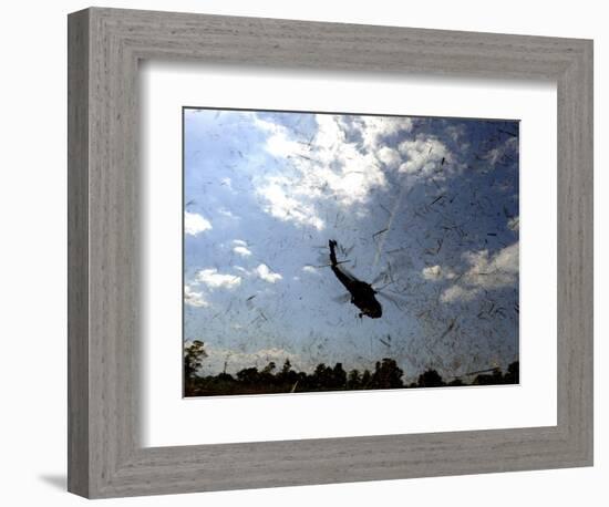 A US Navy Hh-60 Seahawk Stirs Up Debris While Taking Off-null-Framed Photographic Print