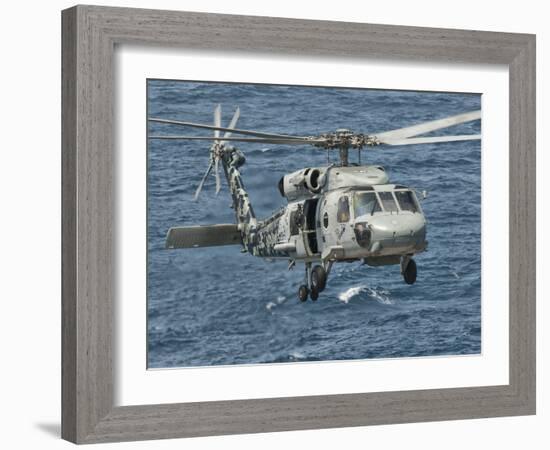 A US Navy SH-60F Seahawk Flying Off the Coast of Pakistan-Stocktrek Images-Framed Photographic Print