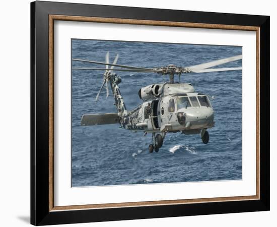 A US Navy SH-60F Seahawk Flying Off the Coast of Pakistan-Stocktrek Images-Framed Photographic Print