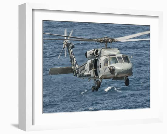 A US Navy SH-60F Seahawk Flying Off the Coast of Pakistan-Stocktrek Images-Framed Photographic Print