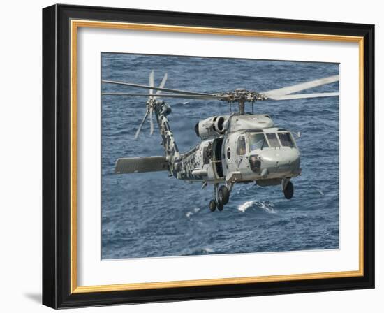 A US Navy SH-60F Seahawk Flying Off the Coast of Pakistan-Stocktrek Images-Framed Photographic Print