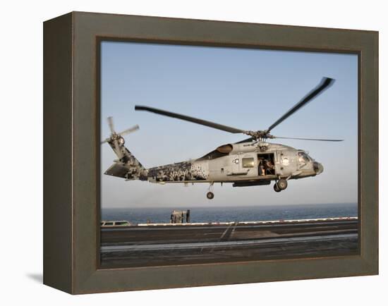 A US Navy SH-60F Seahawk Hovers Above the Flight Deck of USS Eisenhower-Stocktrek Images-Framed Premier Image Canvas