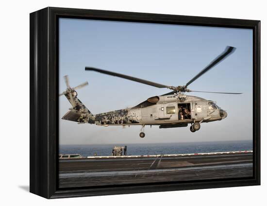 A US Navy SH-60F Seahawk Hovers Above the Flight Deck of USS Eisenhower-Stocktrek Images-Framed Premier Image Canvas