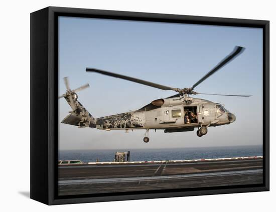 A US Navy SH-60F Seahawk Hovers Above the Flight Deck of USS Eisenhower-Stocktrek Images-Framed Premier Image Canvas