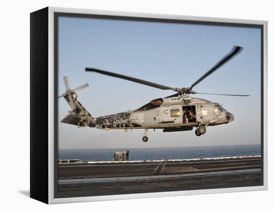 A US Navy SH-60F Seahawk Hovers Above the Flight Deck of USS Eisenhower-Stocktrek Images-Framed Premier Image Canvas