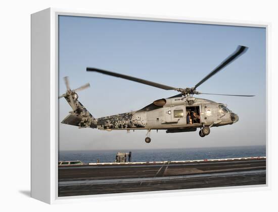 A US Navy SH-60F Seahawk Hovers Above the Flight Deck of USS Eisenhower-Stocktrek Images-Framed Premier Image Canvas