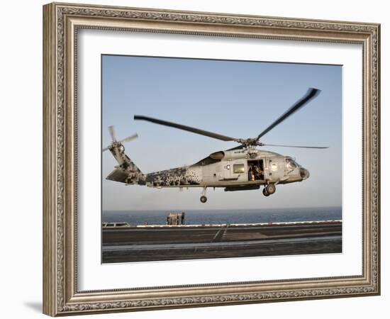 A US Navy SH-60F Seahawk Hovers Above the Flight Deck of USS Eisenhower-Stocktrek Images-Framed Photographic Print