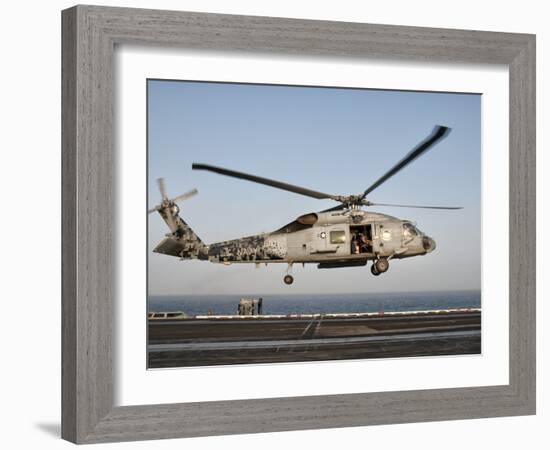 A US Navy SH-60F Seahawk Hovers Above the Flight Deck of USS Eisenhower-Stocktrek Images-Framed Photographic Print