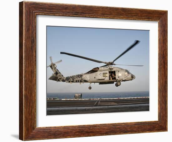 A US Navy SH-60F Seahawk Hovers Above the Flight Deck of USS Eisenhower-Stocktrek Images-Framed Photographic Print