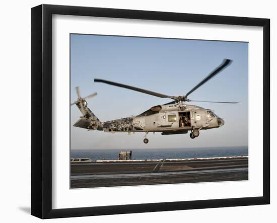 A US Navy SH-60F Seahawk Hovers Above the Flight Deck of USS Eisenhower-Stocktrek Images-Framed Photographic Print