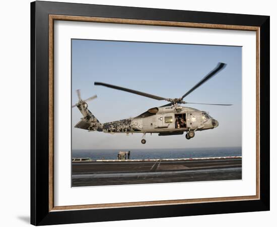 A US Navy SH-60F Seahawk Hovers Above the Flight Deck of USS Eisenhower-Stocktrek Images-Framed Photographic Print