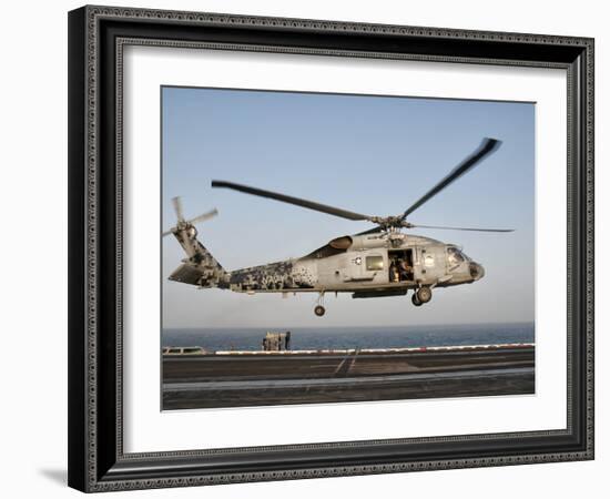 A US Navy SH-60F Seahawk Hovers Above the Flight Deck of USS Eisenhower-Stocktrek Images-Framed Photographic Print