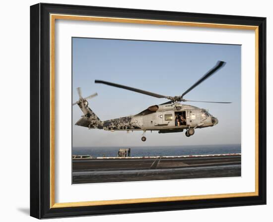 A US Navy SH-60F Seahawk Hovers Above the Flight Deck of USS Eisenhower-Stocktrek Images-Framed Photographic Print