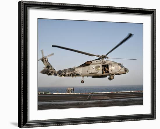 A US Navy SH-60F Seahawk Hovers Above the Flight Deck of USS Eisenhower-Stocktrek Images-Framed Photographic Print