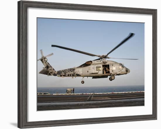 A US Navy SH-60F Seahawk Hovers Above the Flight Deck of USS Eisenhower-Stocktrek Images-Framed Photographic Print