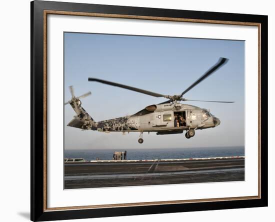 A US Navy SH-60F Seahawk Hovers Above the Flight Deck of USS Eisenhower-Stocktrek Images-Framed Photographic Print