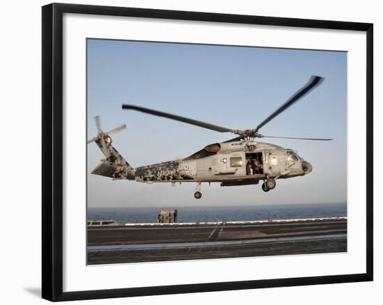 A US Navy SH-60F Seahawk Hovers Above the Flight Deck of USS Eisenhower-Stocktrek Images-Framed Photographic Print