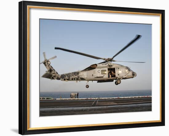 A US Navy SH-60F Seahawk Hovers Above the Flight Deck of USS Eisenhower-Stocktrek Images-Framed Photographic Print