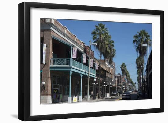 A View of a City Street in Ybor City, Tampa, with the Local High Street and Buildings in View-Natalie Tepper-Framed Photo