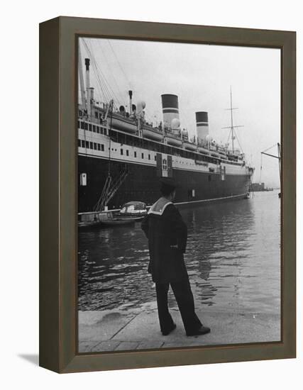 A View of a Sailor Looking at a Ship Docked in the City of Genoa-Carl Mydans-Framed Premier Image Canvas