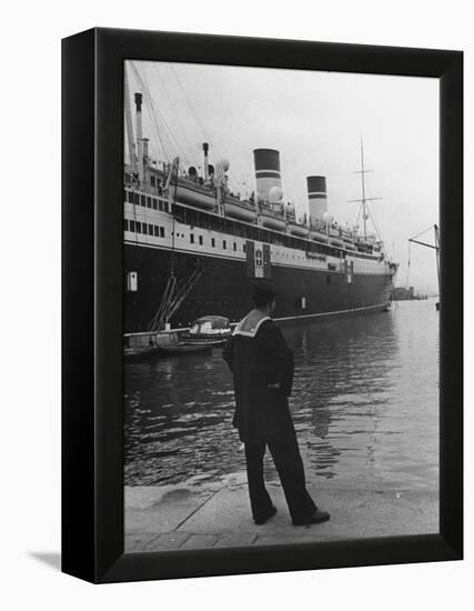 A View of a Sailor Looking at a Ship Docked in the City of Genoa-Carl Mydans-Framed Premier Image Canvas