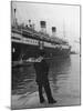 A View of a Sailor Looking at a Ship Docked in the City of Genoa-Carl Mydans-Mounted Premium Photographic Print